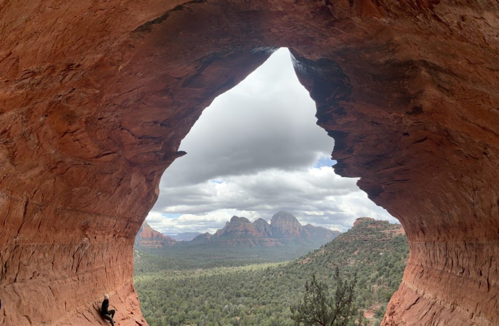 View of the Birthing Cave Hike Sedona with person on the left